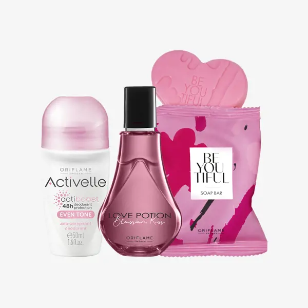 um conjunto de frascos cor-de-rosa e um saco de sabonete