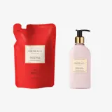 o pungă roșie cu o etichetă albă și o sticlă roz cu o etichetă albă