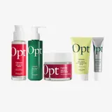 un grupo de frascos y tubos de crema