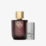 sebotol parfum di samping sebuah wadah
