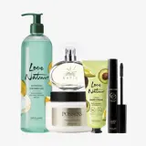a group of cosmetics on a white background