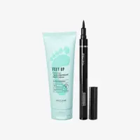sebuah tabung krim dan eyeliner hitam