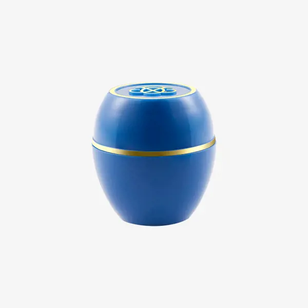 a blue round container with gold trim