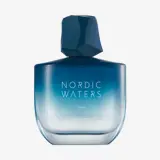 ένα μπλε και λευκό μπουκάλι αρώματος