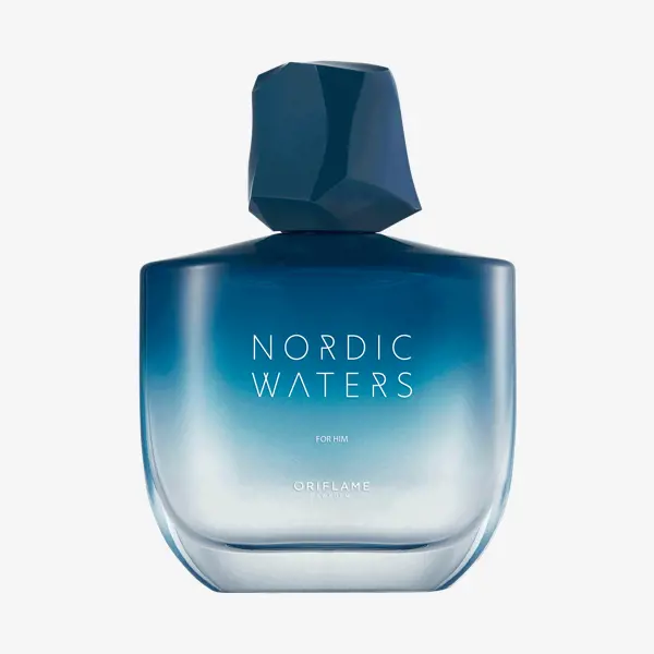 en blå og hvit parfymeflaske