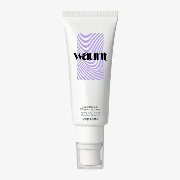 a white tube with purple and black text