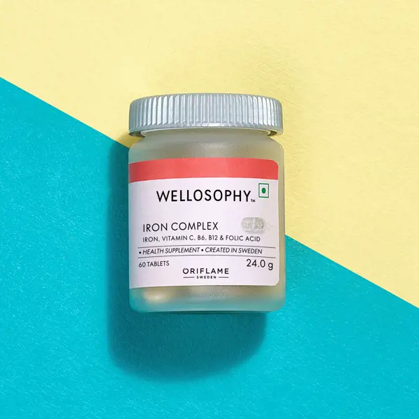 a small plastic container with a label on a blue and yellow background