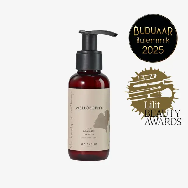 šķidruma pudele ar melnu etiķeti