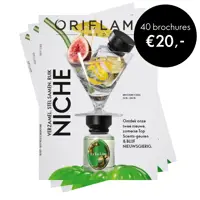 een tijdschrift met een glas vloeistof en een fles vloeistof