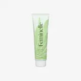 a white tube with green text