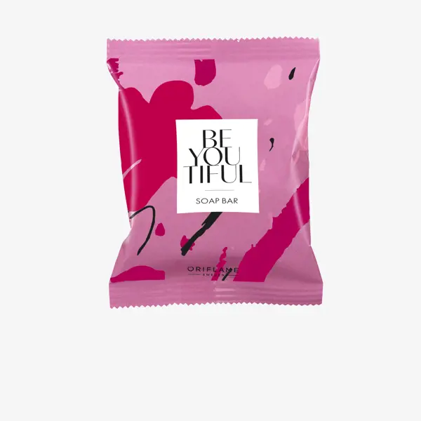 розова опаковка с черен и бял текст