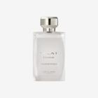 bijela bočica parfema