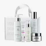 um grupo de frascos brancos e uma caixa branca