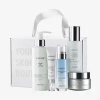 a group of bottles of skincare products