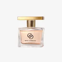un flacon de parfum avec un bouchon en or