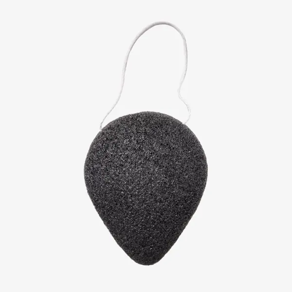 a black sponge with a white string