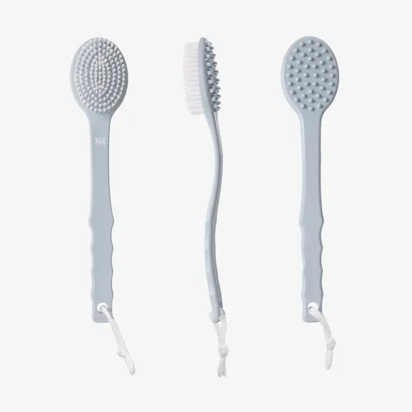 a group of brushes with white bristles