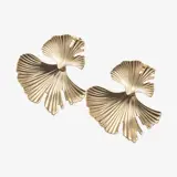 a pair of gold earrings