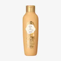a bottle of liquid with gold label