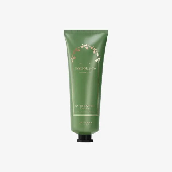 un tubo verde con texto dorado