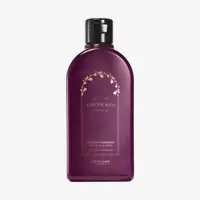 a purple bottle with gold text