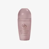 un flacon rose de lotion pour le corps
