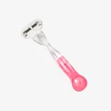 a pink razor with a spoon
