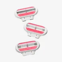 a group of pink and white razors