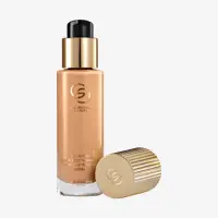 un frasco de base de maquillaje con tapón