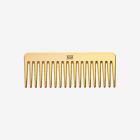 a comb with a white background with Anıtkabir in the background