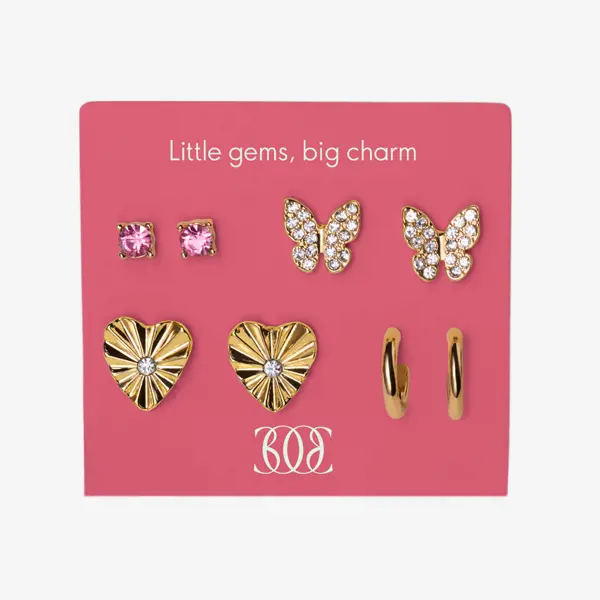 набор сережек и сережек на розовой карточке