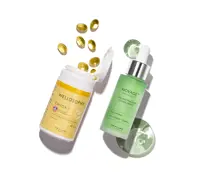 bir şişe serum ve kapsüller