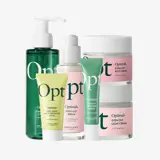 un grupo de frascos de crema y loción