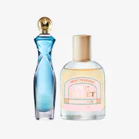 una botella de perfume junto a una botella de perfume