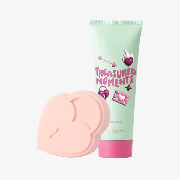 Un tubo de crema y un objeto rosa con forma de corazón.