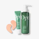 un frasco verde y un tubo de crema y un tubo de crema