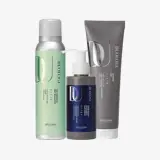 un grupo de botellas de champú y un tubo de líquido