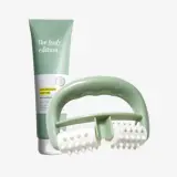 un masajeador verde y un tubo de crema