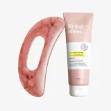 un tubo rosa de crema junto a un objeto rosa