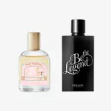 una botella de perfume junto a una botella de perfume