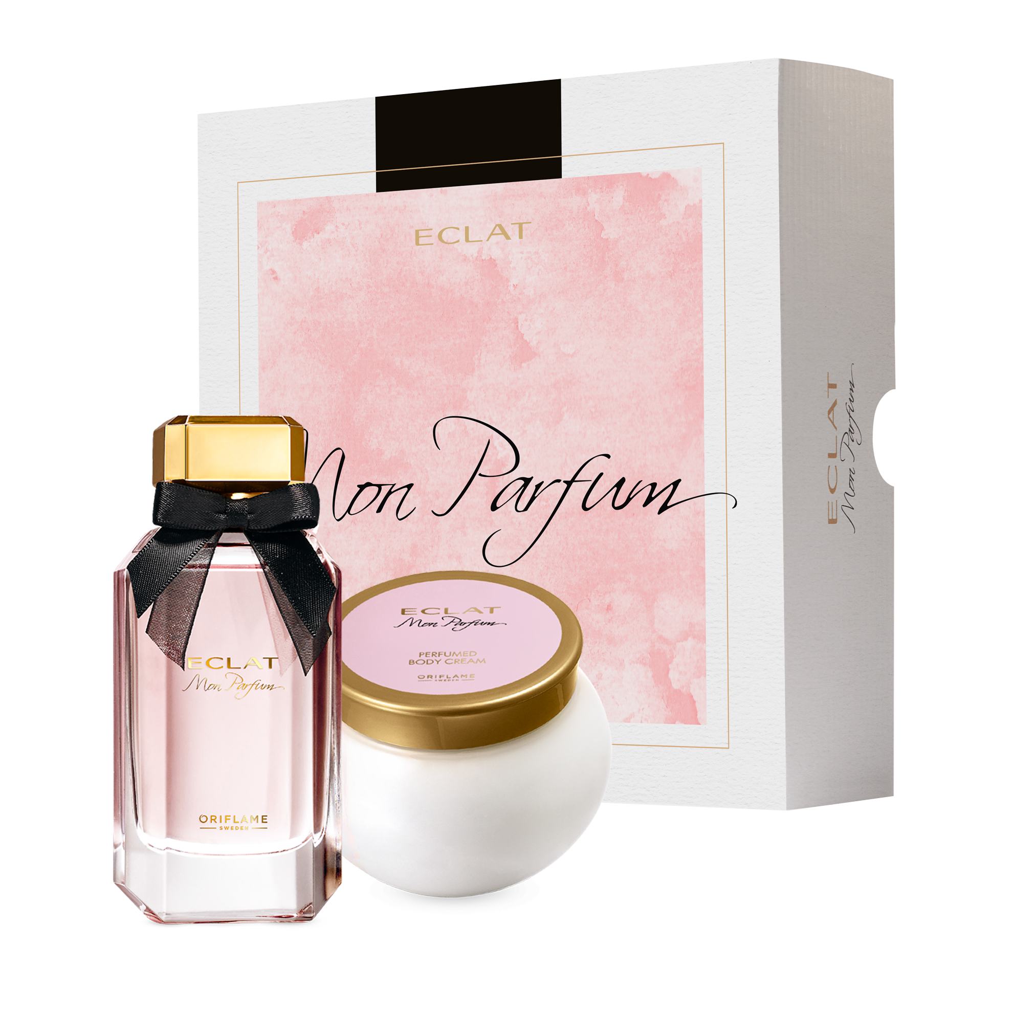 a bottle of perfume next to a box