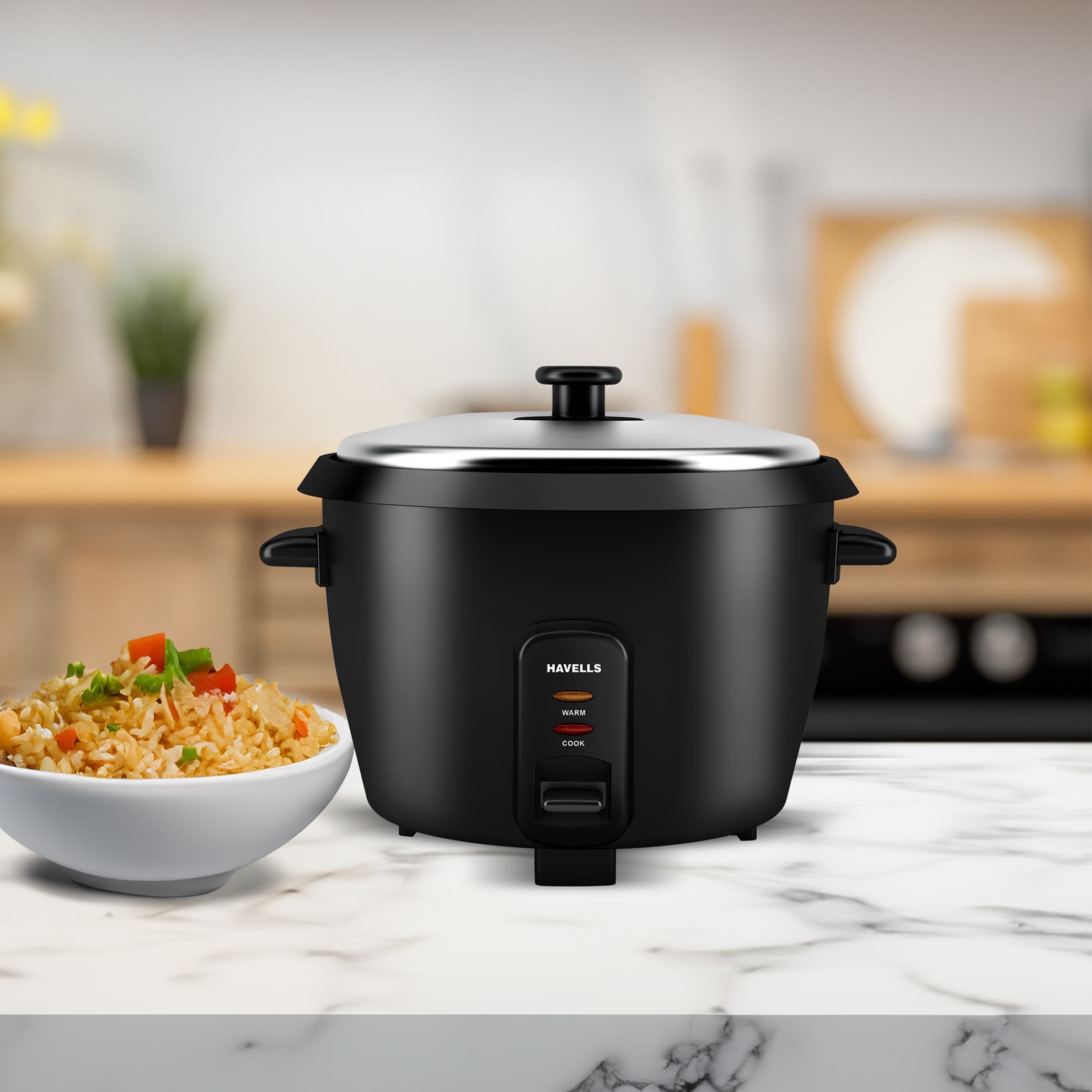 a rice cooker and a bowl of rice