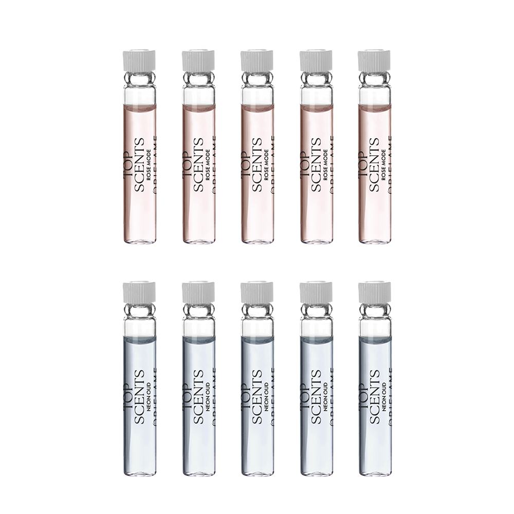 skupina malých fľaštičiek s rôznofarebnou tekutinou