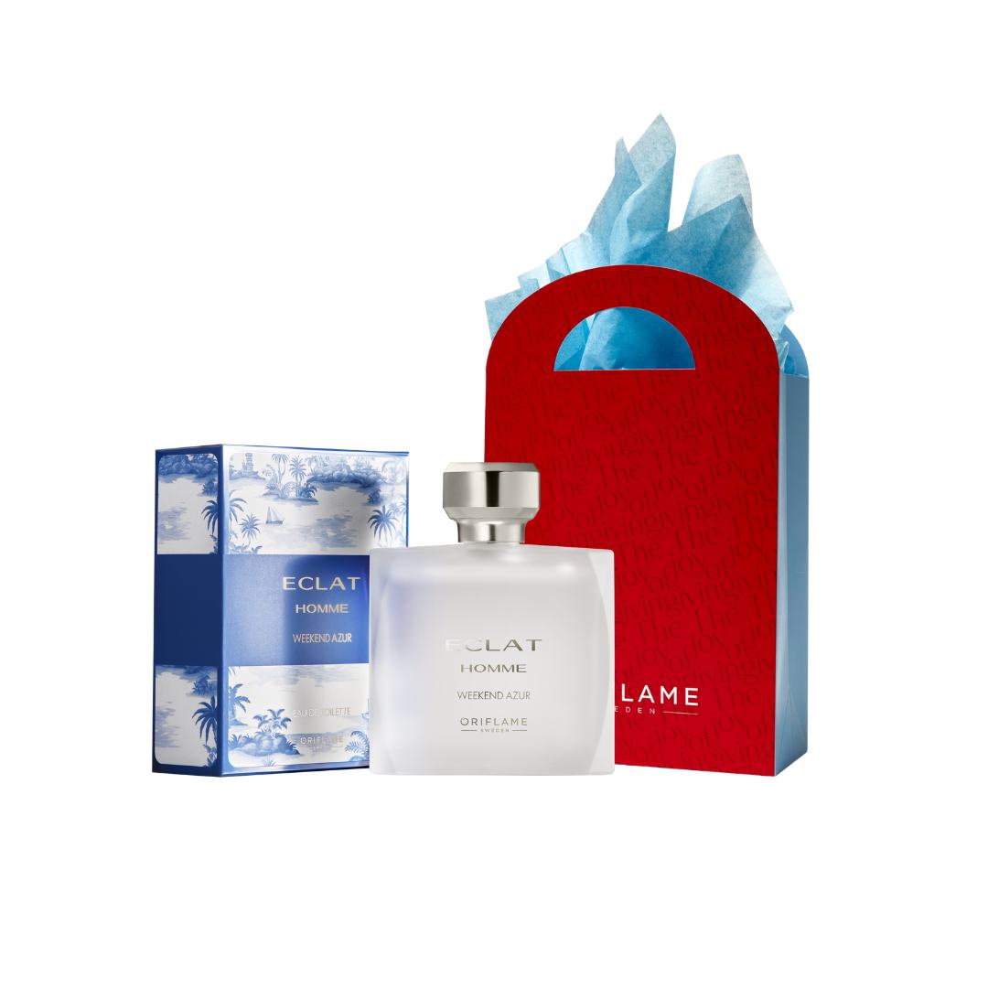 a bottle of perfume next to a box