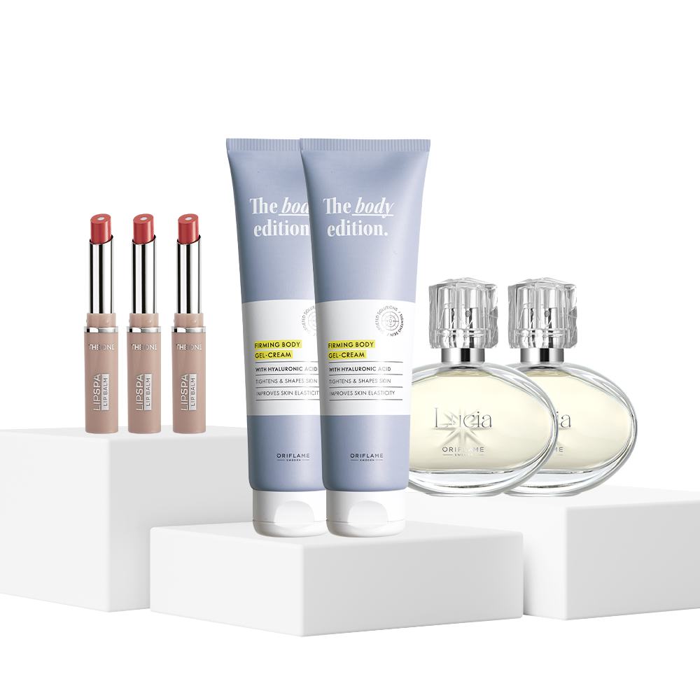 un groupe de cosmétiques sur un podium blanc