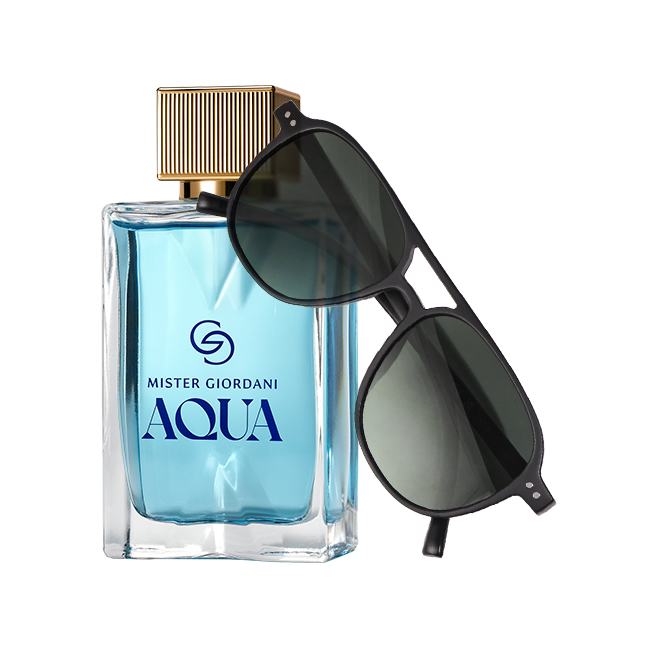 un frasco de perfume y unas gafas de sol