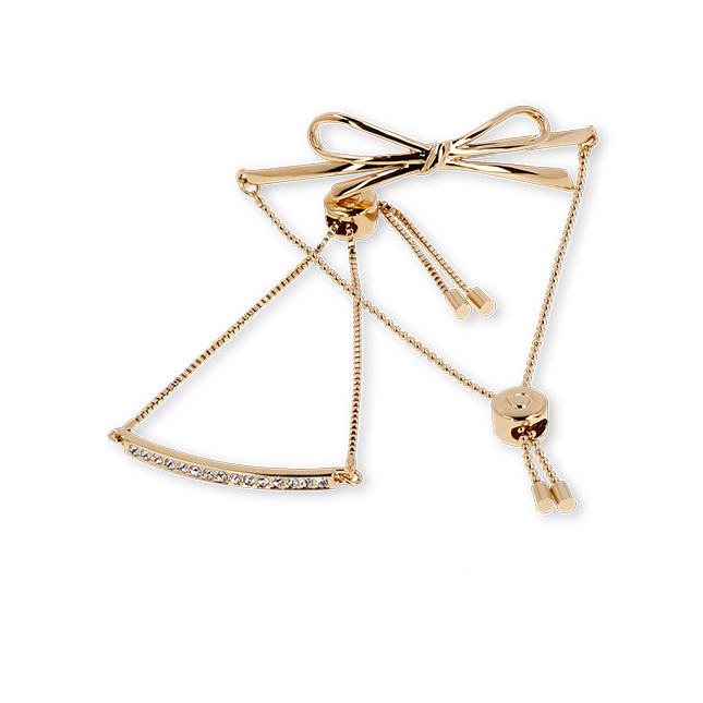 Un collar de oro con un lazo.