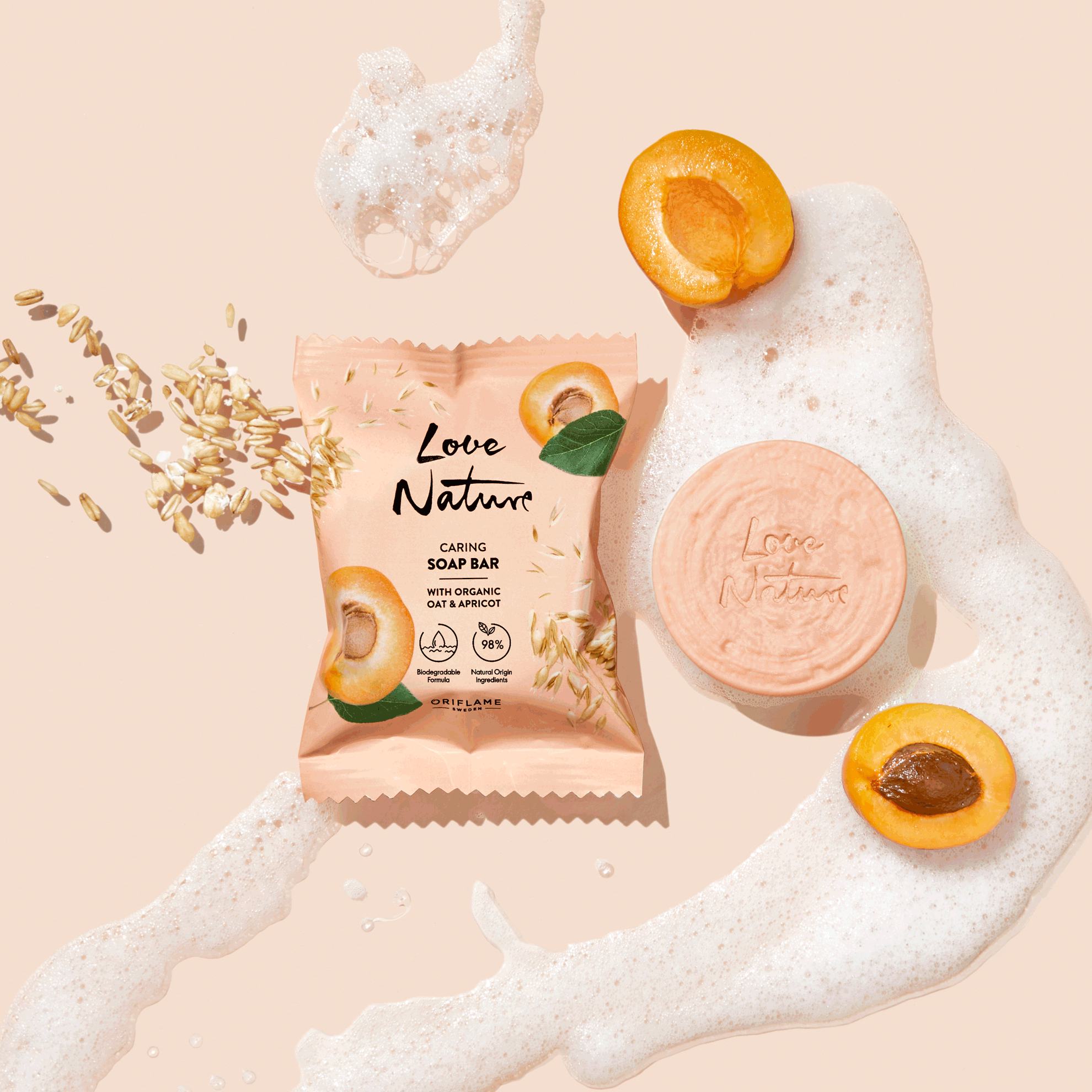 a peach colored package with a peach and a peach colored bag with a peach and a peach colored bag with a peach colored bag with a peach colored bag with a peach colored bag with a peach colored