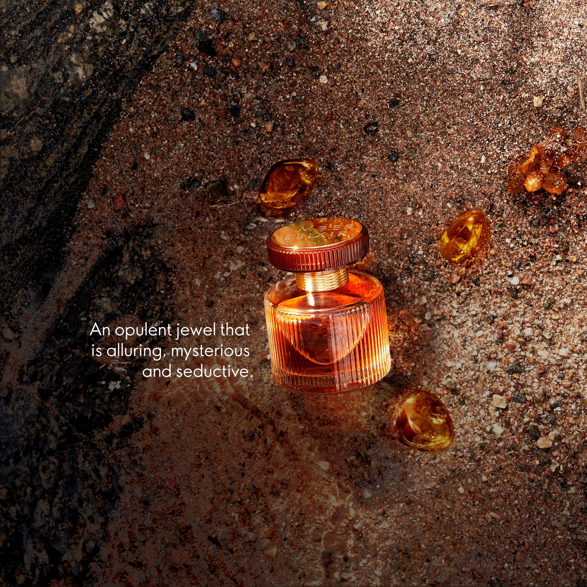 a bottle of perfume on the ground