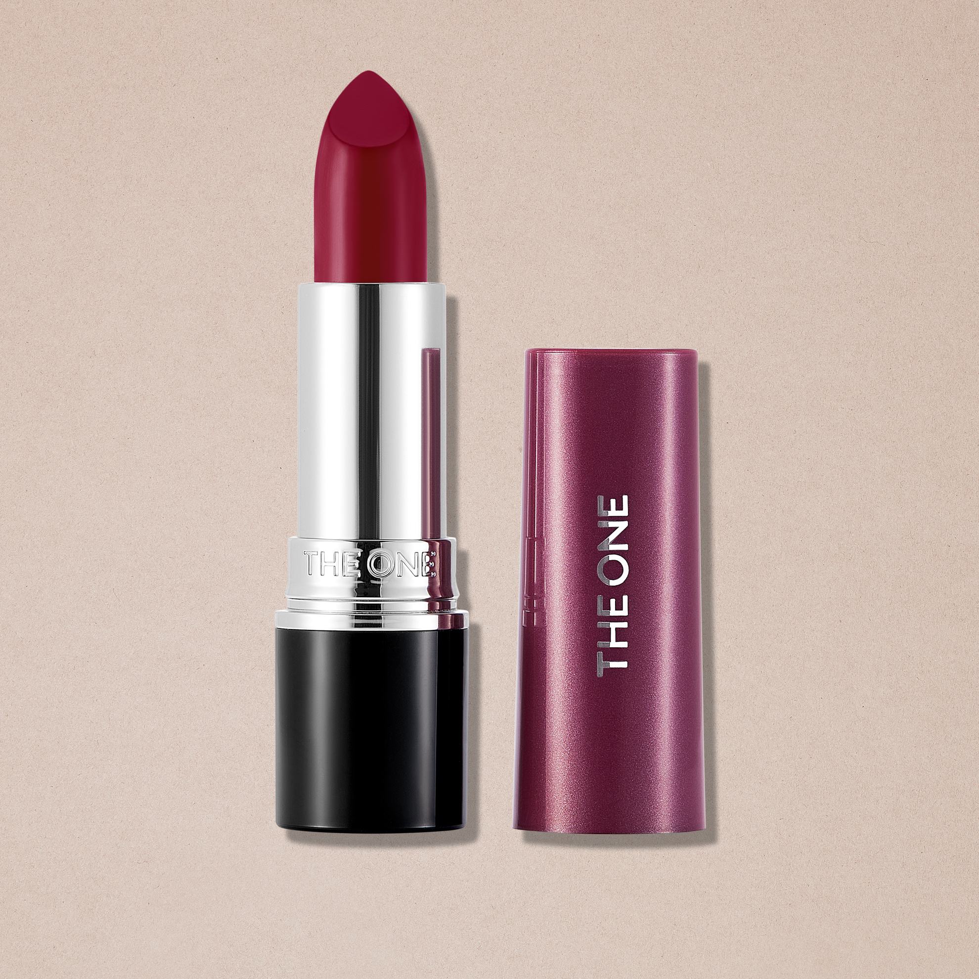 a red lipstick with a tube